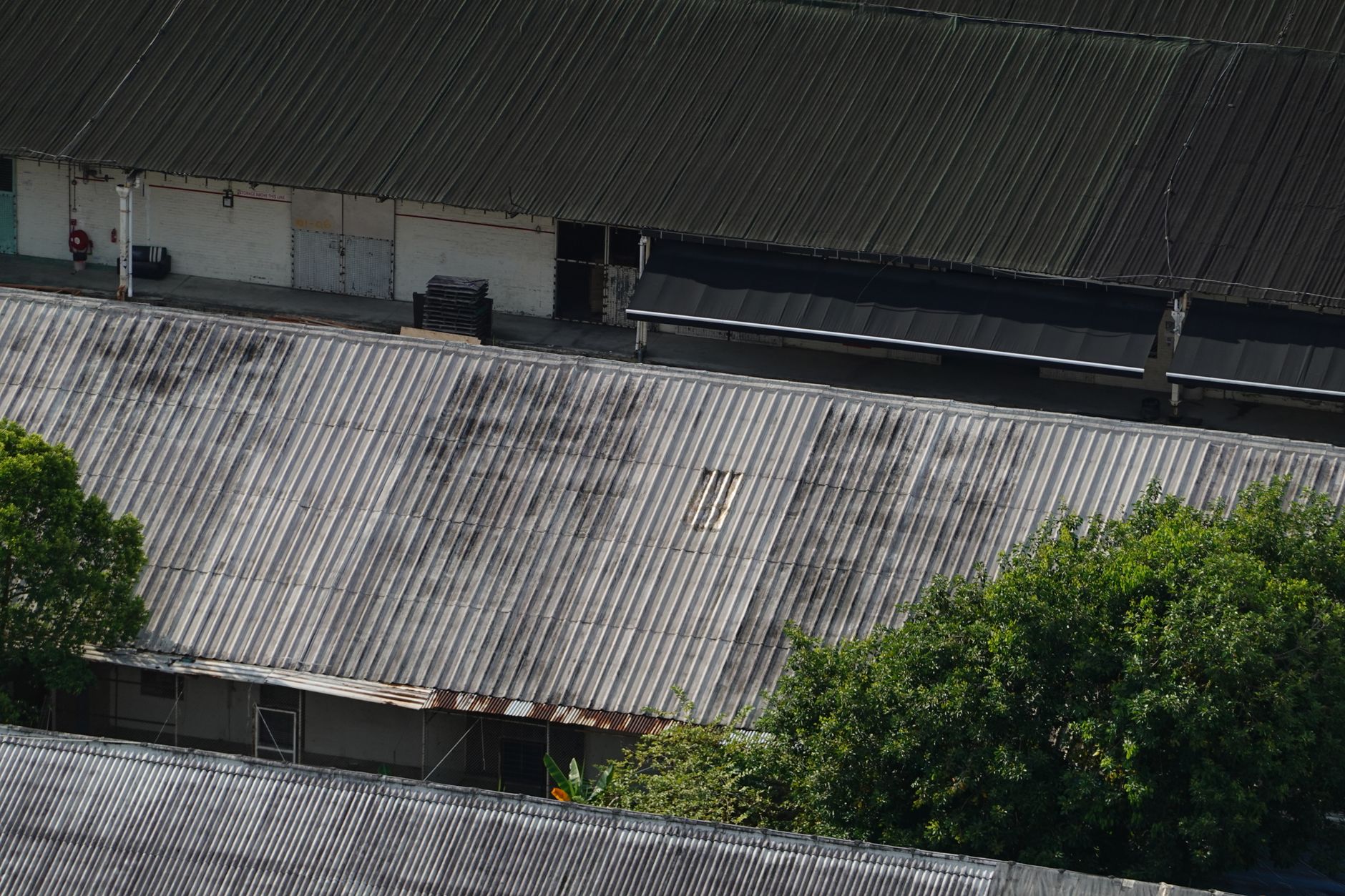 Commercial roofing crew on a low-slope building, Cleveland OH