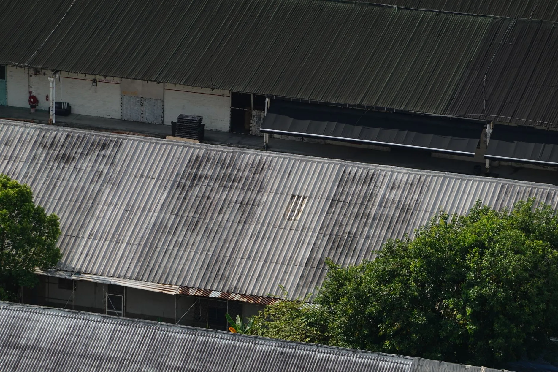 Commercial roofing crew on a low-slope building, Cleveland OH