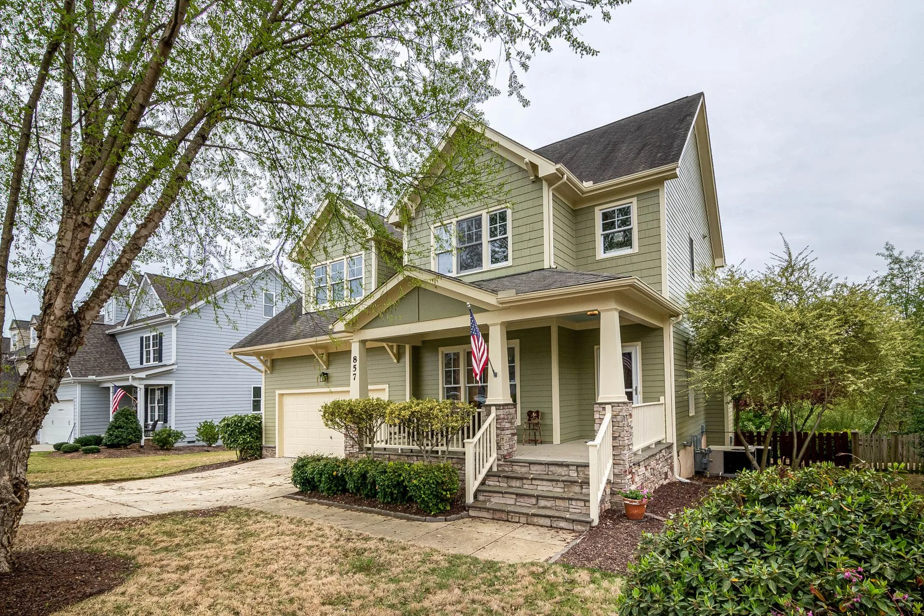 Two-story home exterior after a full re-roof, Mayfield Heights OH