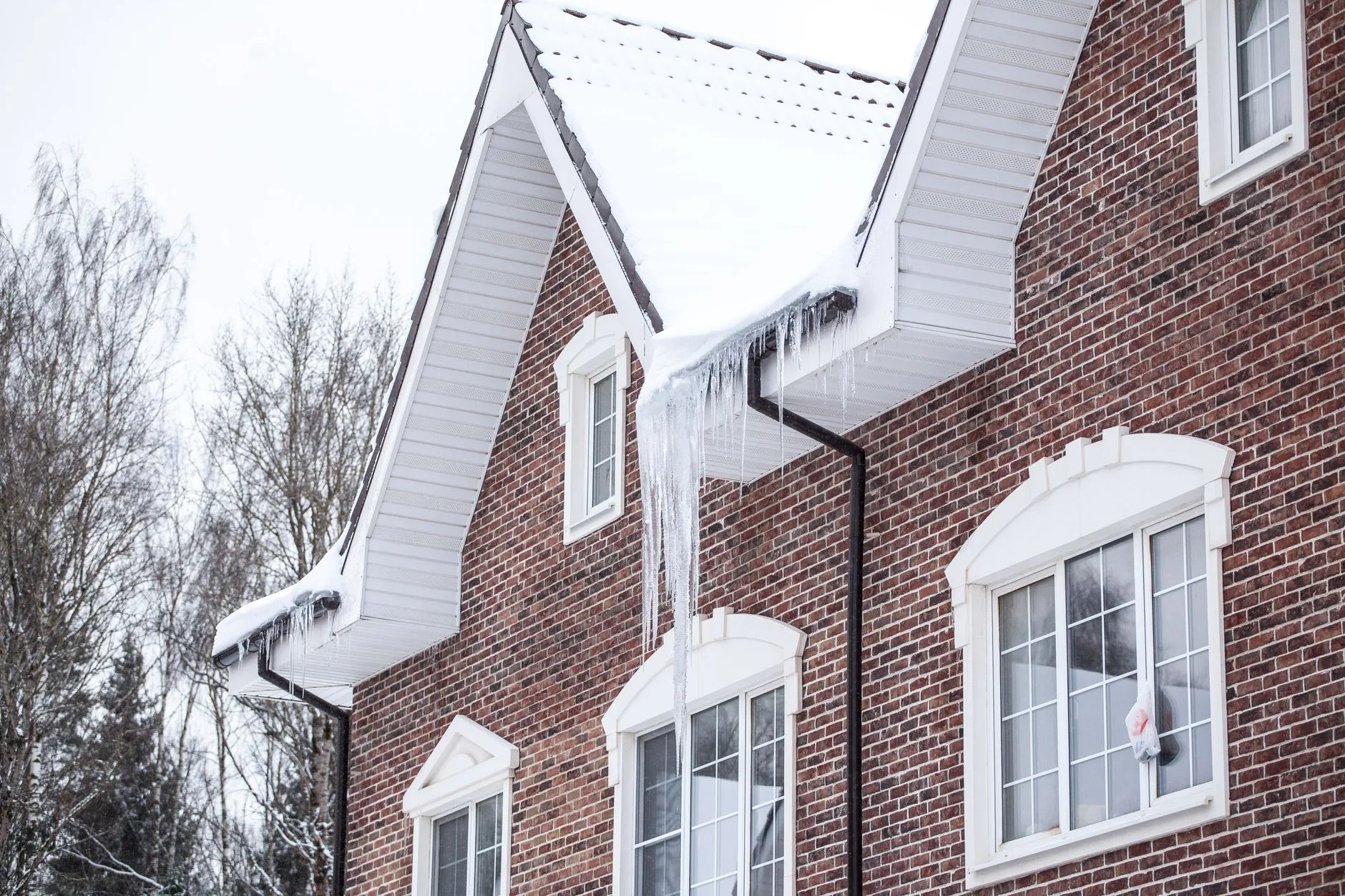 Ice dam removal and eave inspection after a hard freeze, Lyndhurst OH