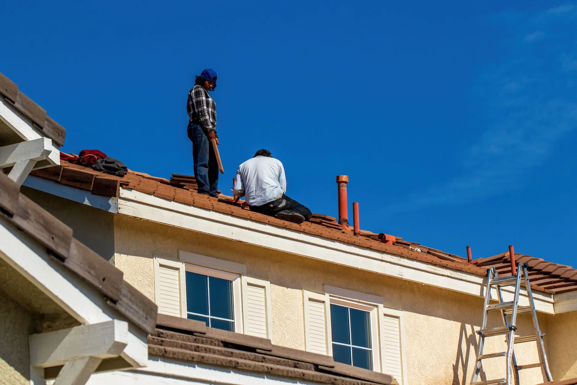 Nail-gun shingle install on a two-story addition, Avon Lake OH